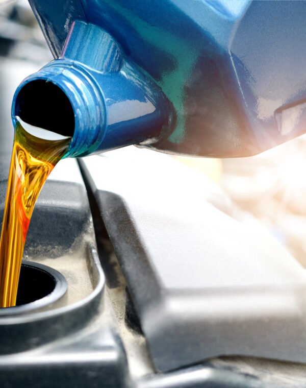 Refueling and pouring oil quality into the engine motor car Transmission and Maintenance Gear .Energy fuel concept.